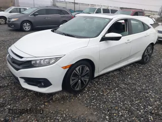 2017 Honda Civic Sedan EX-L with VIN 2HGFC1F74HH648624, listed as a IAAI auction lot 41556540 with 79,147 mi miles. Bid and sale history available at carsss.com. Image 2.