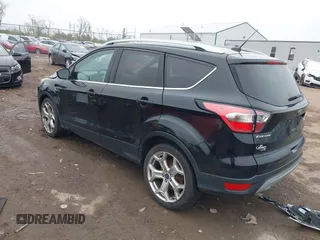 2017 Ford Escape Titanium with VIN 1FMCU0J95HUD37858, listed as a IAAI auction lot 41984629 with 87,163 mi miles and . Bid and sale history available at DreamBid. Image 3.