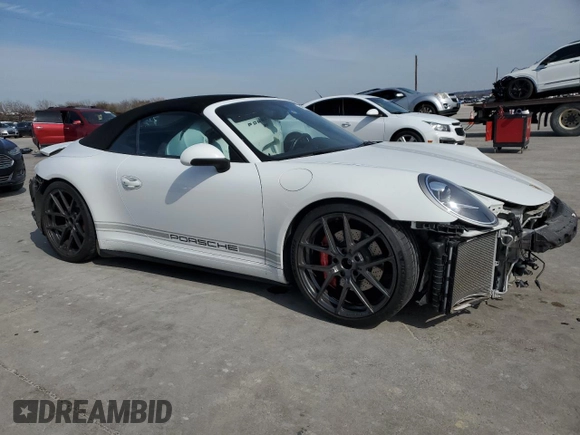 2015 Porsche 911 Carrera S with VIN WP0CB2A95FS154734, listed as a Copart auction lot 45084485 with 28,801 mi miles and Salvage Title. Bid and sale history available at DreamBid. Image 4.