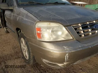 2005 Ford Freestar SE z VIN 2FMZA51645BA05742, wystawiony jako IAAI lot #41429194 z przebiegiem 145 415 mil mil oraz . Historia ofert i sprzedaży dostępna na DreamBid. Obrazek 6.