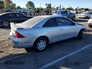 2001 Honda Civic LX with VIN 1HGEM21581L007005, listed as a Copart auction lot 80998594 with 0 mi miles and Salvage Title. Bid and sale history available at carsss.com. Image 3.