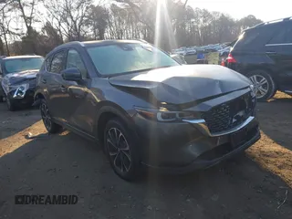 2022 Mazda CX-5 2.5 S Premium Package with VIN JM3KFBDM3N0648088, listed as a IAAI auction lot 41243593 with 18,324 mi miles. Bid and sale history available at carsss.com. Image 1.