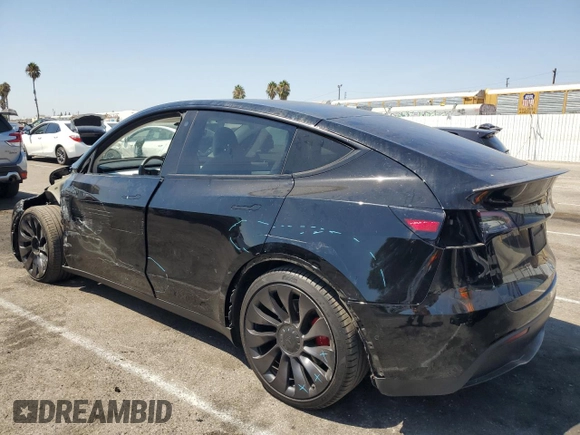 2022 Tesla Model Y Performance with VIN 7SAYGDEF4NF436834, listed as a Copart auction lot 68992234 with 22,171 mi miles and Salvage title. Bid and sale history available at DreamBid. Image 2.