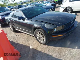 2007 Ford Mustang Deluxe z VIN 1ZVFT80N975339457, wystawiony jako IAAI lot #42080705 z przebiegiem 174 771 mil mil oraz . Historia ofert i sprzedaży dostępna na DreamBid. Obrazek 1.