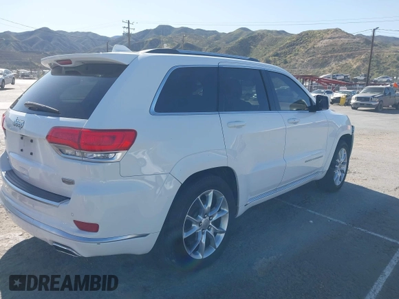 2016 Jeep Grand Cherokee with VIN 1C4RJEJM8GC321506, listed as a IAAI auction lot 41969587 with 226,072 mi miles and . Bid and sale history available at DreamBid. Image 4.
