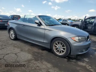 2011 BMW 1 Series 128i with VIN WBAUN1C52BVH82744, listed as a Copart auction lot 63441125 with 129,245 mi miles and Salvage title. Bid and sale history available at DreamBid. Image 4.