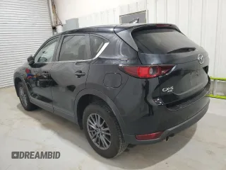 2021 Mazda CX-5 Touring with VIN JM3KFBCM5M0343577, listed as a Copart auction lot 52411005 with 70,372 mi miles and Clean Title. Bid and sale history available at carsss.com. Image 2.