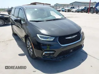 2023 Chrysler Pacifica Hybrid Touring L with VIN 2C4RC1L77PR540958, listed as a IAAI auction lot 42010484 with 61,166 mi miles and . Bid and sale history available at DreamBid. Image 1.