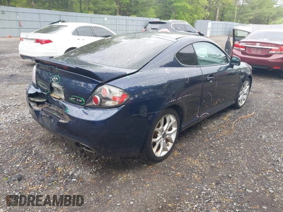 2008 Hyundai Tiburon GT z VIN KMHHN66F98U281833, wystawiony jako IAAI lot #42242717 z przebiegiem 123 291 mil mil oraz . Historia ofert i sprzedaży dostępna na DreamBid. Obrazek 4.