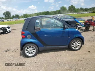 2009 Smart fortwo Pure with VIN WMEEJ31X59K218003, listed as a Copart auction lot 62413775 with 82,711 mi miles and Salvage title. Bid and sale history available at DreamBid. Image 3.