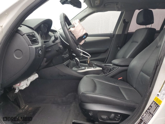2015 BMW X1 xDrive28i with VIN WBAVL1C5XFVY29256, listed as a Copart auction lot 50906475 with 127,191 mi miles and Salvage Title. Bid and sale history available at carsss.com. Image 7.