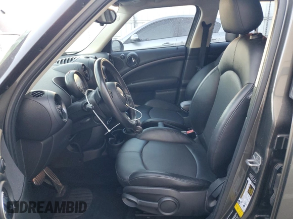2014 MINI Countryman S with VIN WMWZC3C59EWP29137, listed as a Copart auction lot 79721804 with 124,871 mi miles and Salvage title. Bid and sale history available at DreamBid. Image 7.