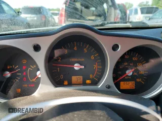 2005 Nissan 350Z Touring z VIN JN1AZ36A95M751810, wystawiony jako Copart lot #55104085 z przebiegiem 99 278 mil mil oraz Szkoda całkowita • Salvage title. Historia ofert i sprzedaży dostępna na DreamBid. Obrazek 9.