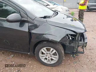 2014 Chevrolet Sonic LT with VIN 1G1JC5SH1E4236385, listed as a IAAI auction lot 42066948 with 126,200 mi miles and . Bid and sale history available at DreamBid. Image 12.
