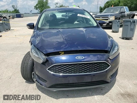 2016 Ford Focus SE z VIN 1FADP3F23GL288232, wystawiony jako Copart lot #62565095 z przebiegiem 11 634 mil mil oraz Szkoda całkowita • Salvage title. Historia ofert i sprzedaży dostępna na DreamBid. Obrazek 13.