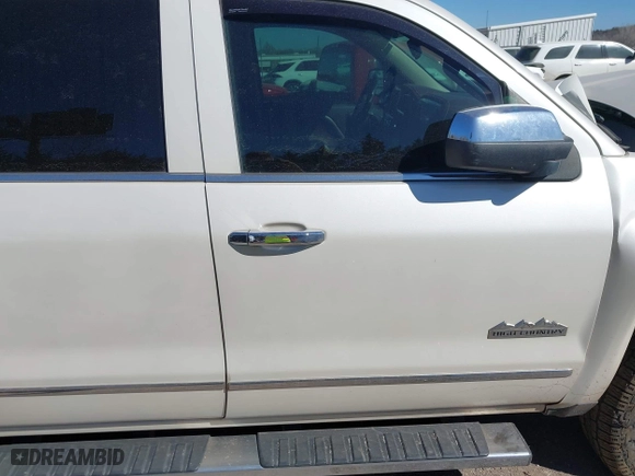 2015 Chevrolet Silverado 1500 High Country with VIN 3GCUKTEJ2FG434388, listed as a IAAI auction lot 41677014 with 117,959 mi miles. Bid and sale history available at carsss.com. Image 14.