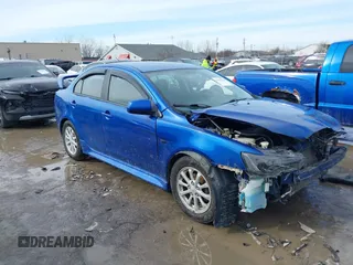 2012 Mitsubishi Lancer SE with VIN JA32V2FWXCU016364, listed as a IAAI auction lot 41619504 with 139,260 mi miles. Bid and sale history available at carsss.com. Image 1.