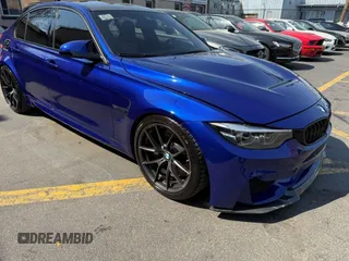 2018 BMW M3 with VIN WBS8M9C59J5L71951, listed as a IAAI auction lot 42129203 with 50,011 mi miles. Bid and sale history available at carsss.com. Image 1.