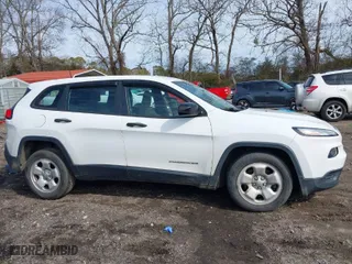 2015 Jeep Cherokee Sport with VIN 1C4PJLAB1FW531355, listed as a IAAI auction lot 41463825 with 130,533 mi miles. Bid and sale history available at carsss.com. Image 13.
