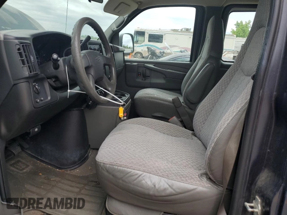 2007 Chevrolet Express Passenger z VIN 1GAHG39U571152181, wystawiony jako Copart lot #56238115 z przebiegiem 170 521 mil mil oraz Czysty tytuł • Clean title. Historia ofert i sprzedaży dostępna na DreamBid. Obrazek 7.