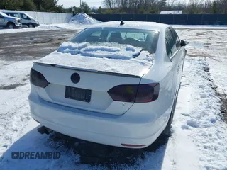 2012 Volkswagen Jetta Sedan SE w/Convenience with VIN 3VWDX7AJ1CM062454, listed as a IAAI auction lot 41580811 with 119,760 mi miles. Bid and sale history available at carsss.com. Image 4.