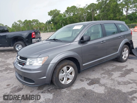 2013 Dodge Journey SE with VIN 3C4PDCAB6DT529949, listed as a IAAI auction lot 42609006 with 38,202 mi miles and . Bid and sale history available at DreamBid. Image 2.