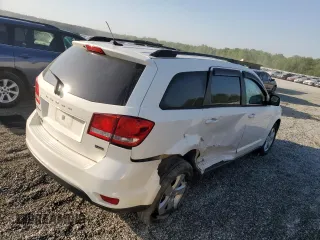 2012 Dodge Journey SXT z VIN 3C4PDCBGXCT153166, wystawiony jako Copart lot #53843265 z przebiegiem 177 289 mil mil oraz Szkoda całkowita • Salvage title. Historia ofert i sprzedaży dostępna na DreamBid. Obrazek 3.