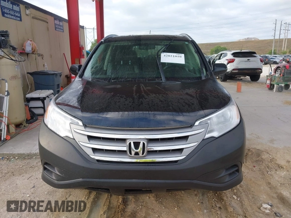 2012 Honda CR-V EX-L with VIN JHLRM3H71CC006913, listed as a IAAI auction lot 42021010 with 173,470 mi miles. Bid and sale history available at carsss.com. Image 12.