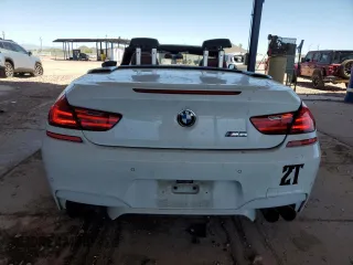 2013 BMW M6 с VIN WBSLZ9C59DDZ77823, выставлен на аукционе Copart как лот 62354225 с пробегом 74 704 миль миль и Списание • Salvage title. История ставок и продаж доступна на DreamBid. Изображение 6.