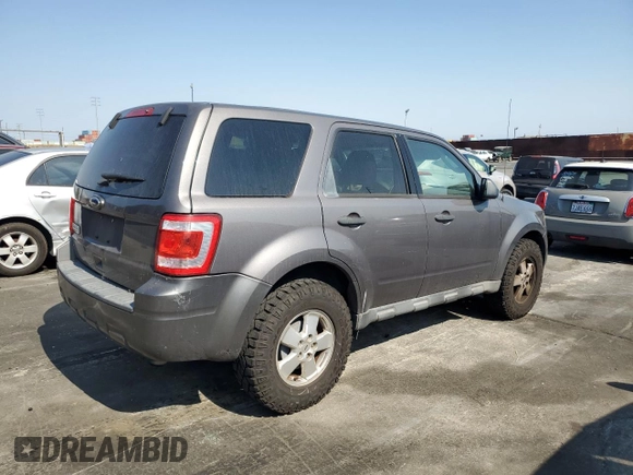 2011 Ford Escape XLS with VIN 1FMCU0C79BKC12943, listed as a Copart auction lot 64702085 with 151,117 mi miles and Clean title. Bid and sale history available at DreamBid. Image 3.