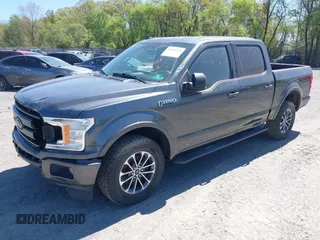 2018 Ford F-150 XL with VIN 1FTEW1EG2JFE55513, listed as a IAAI auction lot 41530354 with 132,617 mi miles. Bid and sale history available at carsss.com. Image 21.