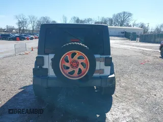 2016 Jeep Wrangler Unlimited Rubicon Hard Rock with VIN 1C4HJWFG9GL296782, listed as a IAAI auction lot 41595273 with 113,338 mi miles. Bid and sale history available at carsss.com. Image 16.