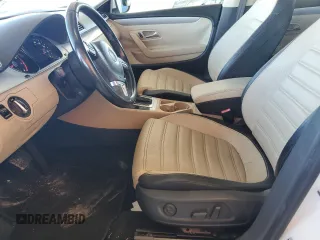 2014 Volkswagen CC R-Line with VIN WVWBP7AN6EE521807, listed as a Copart auction lot 74177764 with 142,779 mi miles and Clean Title. Bid and sale history available at carsss.com. Image 7.