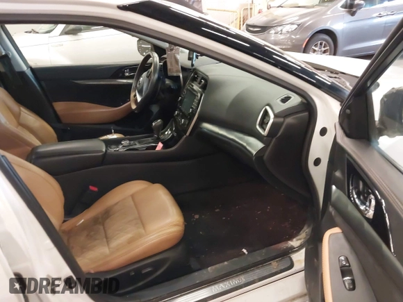 2016 Nissan Maxima SL with VIN 1N4AA6AP2GC399721, listed as a IAAI auction lot 41818252 with 64,386 mi miles and . Bid and sale history available at DreamBid. Image 5.