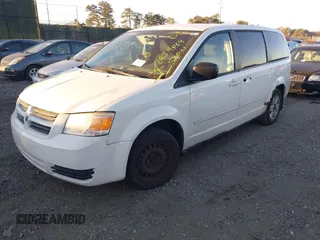 2010 Dodge Grand Caravan SE with VIN 2D4RN4DE8AR498559, listed as a IAAI auction lot 40886502 with Not Provided miles and . Bid and sale history available at DreamBid. Image 2.