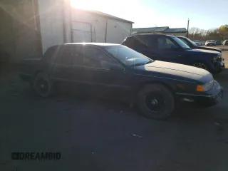 1992 Mercury Cougar z VIN 1MEPM6046NH628614, wystawiony jako Copart lot #77434664 z przebiegiem 83 518 mil mil oraz Szkody całkowita. Historia ofert i sprzedaży dostępna na DreamBid. Obrazek 4.