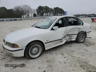 1997 BMW 5 Series 528i with VIN WBADD5321VBV51708, listed as a Copart auction lot 86942384 with 0 mi miles and Salvage Title. Bid and sale history available at carsss.com. Image 1.