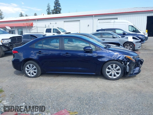 2023 Toyota Corolla LE with VIN 5YFB4MDE2PP052532, listed as a IAAI auction lot 42169698 with 32,622 mi miles. Bid and sale history available at carsss.com. Image 13.