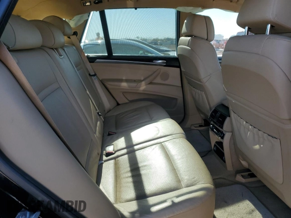 2013 BMW X5 xDrive35i z VIN 5UXZV4C53D0B24617, wystawiony jako Copart lot #48004515 z przebiegiem Nie podano mil oraz Szkody całkowita. Historia ofert i sprzedaży dostępna na DreamBid. Obrazek 11.