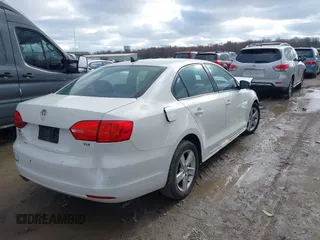2012 Volkswagen Jetta TDI w/Premium & Nav with VIN 3VWLL7AJ8CM094552, listed as a IAAI auction lot 41962900 with 158,868 mi miles and . Bid and sale history available at DreamBid. Image 4.