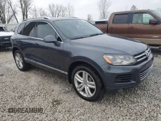 2012 Volkswagen Touareg Sport z VIN WVGFK9BP6CD005005, wystawiony jako Copart lot #46802355 z przebiegiem 141 430 mil mil oraz Czysty tytuł • Clean title. Historia ofert i sprzedaży dostępna na DreamBid. Obrazek 4.