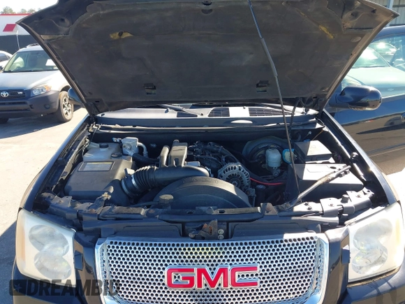 2008 GMC Envoy Denali with VIN 1GKET63M082175769, listed as a IAAI auction lot 41604135 with 136,013 mi miles. Bid and sale history available at carsss.com. Image 10.
