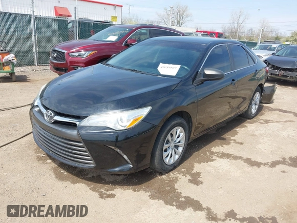 2016 Toyota Camry XLE with VIN 4T4BF1FK0GR581297, listed as a IAAI auction lot 42059507 with 151,777 mi miles. Bid and sale history available at carsss.com. Image 18.