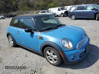 2013 MINI Hardtop with VIN WMWSU3C50DT682885, listed as a Copart auction lot 54238515 with 115,712 mi miles and Salvage Title. Bid and sale history available at DreamBid. Image 4.