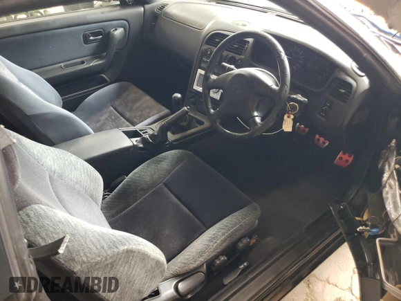 1997 Nissan Skyline z VIN HR33101590, wystawiony jako Copart lot #68650354 z przebiegiem 76 082 mil mil oraz Szkoda całkowita • Salvage title. Historia ofert i sprzedaży dostępna na DreamBid. Obrazek 8.