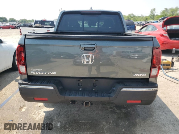 2017 Honda Ridgeline RTL-E with VIN 5FPYK3F74HB039715, listed as a Copart auction lot 60271415 with 56,892 mi miles and Salvage title. Bid and sale history available at DreamBid. Image 6.