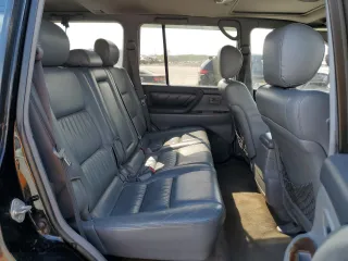 1999 Toyota Land Cruiser with VIN JT3HT05J8X0060988, listed as a Copart auction lot 52764175 with 217,199 mi miles and Salvage Title. Bid and sale history available at carsss.com. Image 11.
