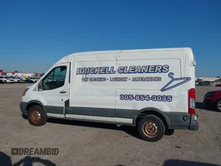 2015 Ford Transit Cargo with VIN 1FTNE2CM9FKA64133, listed as a IAAI auction lot 41312926 with 117,176 mi miles and . Bid and sale history available at carsss.com. Image 14.