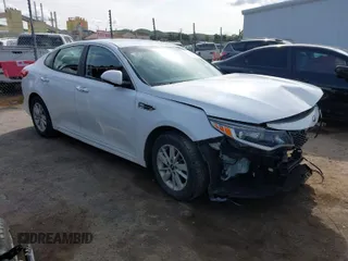 2016 Kia Optima LX z VIN 5XXGT4L31GG111104, wystawiony jako IAAI lot #41945908 z przebiegiem 81 084 mil mil oraz . Historia ofert i sprzedaży dostępna na DreamBid. Obrazek 1.