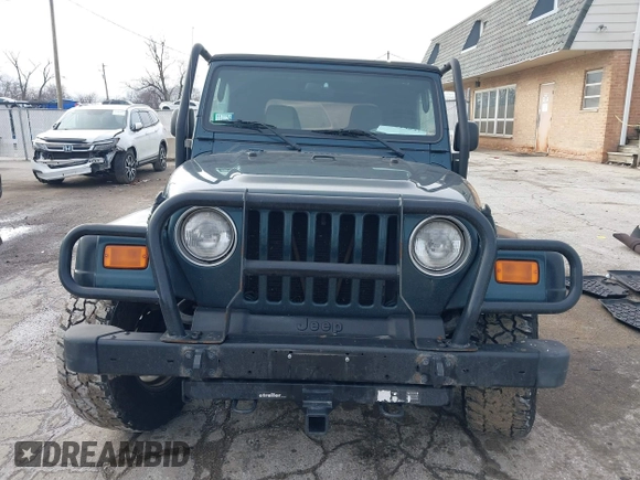 2005 Jeep Wrangler SE with VIN 1J4FA29S45P333916, listed as a IAAI auction lot 41214841 with 90,577 mi miles. Bid and sale history available at carsss.com. Image 12.